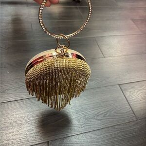 Elegant Gold Fringe Clutch